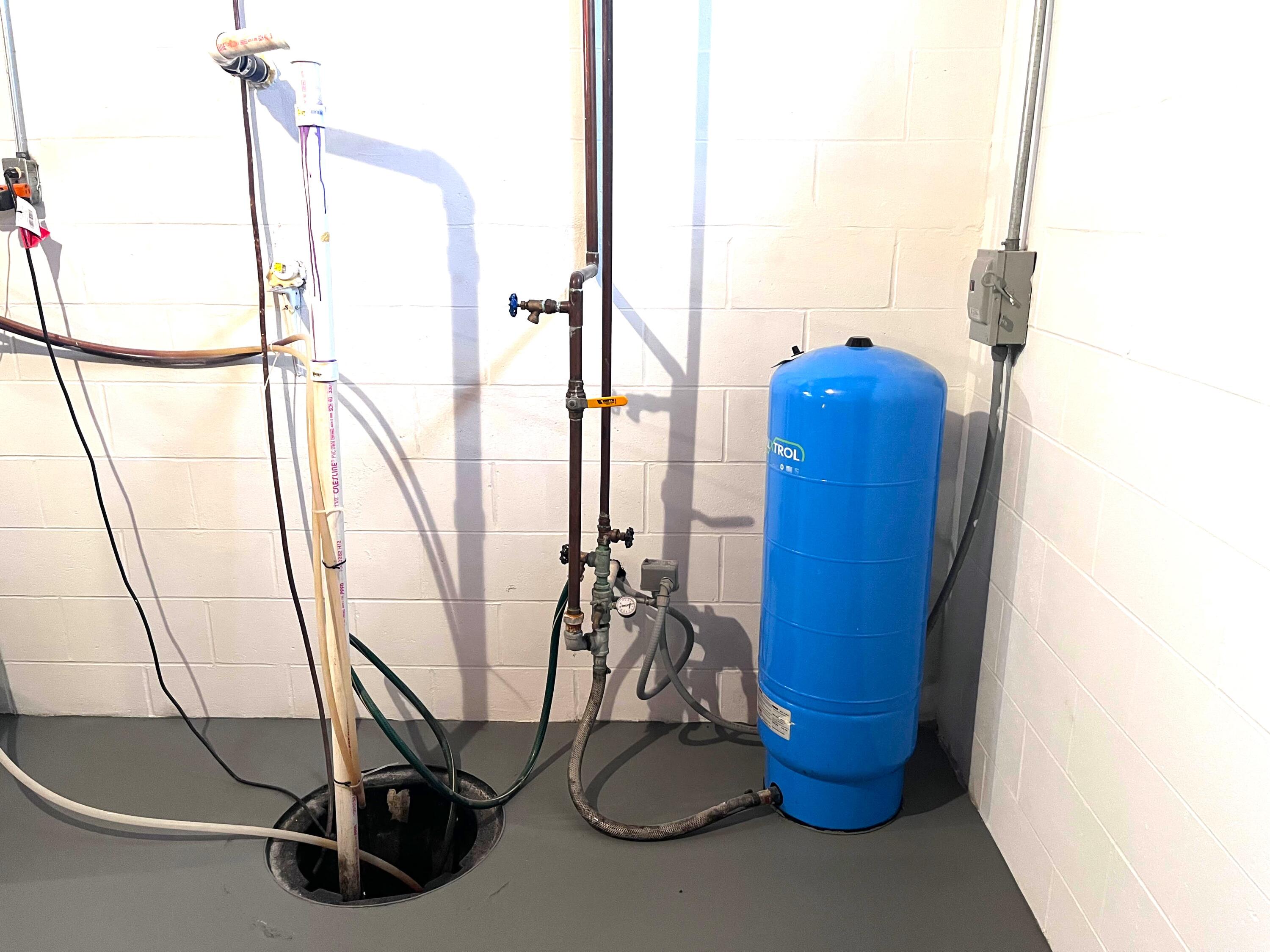 10775 Pine Creek Road Manistee, MI 49660 - Photo 39 of 74 Sump and water tank