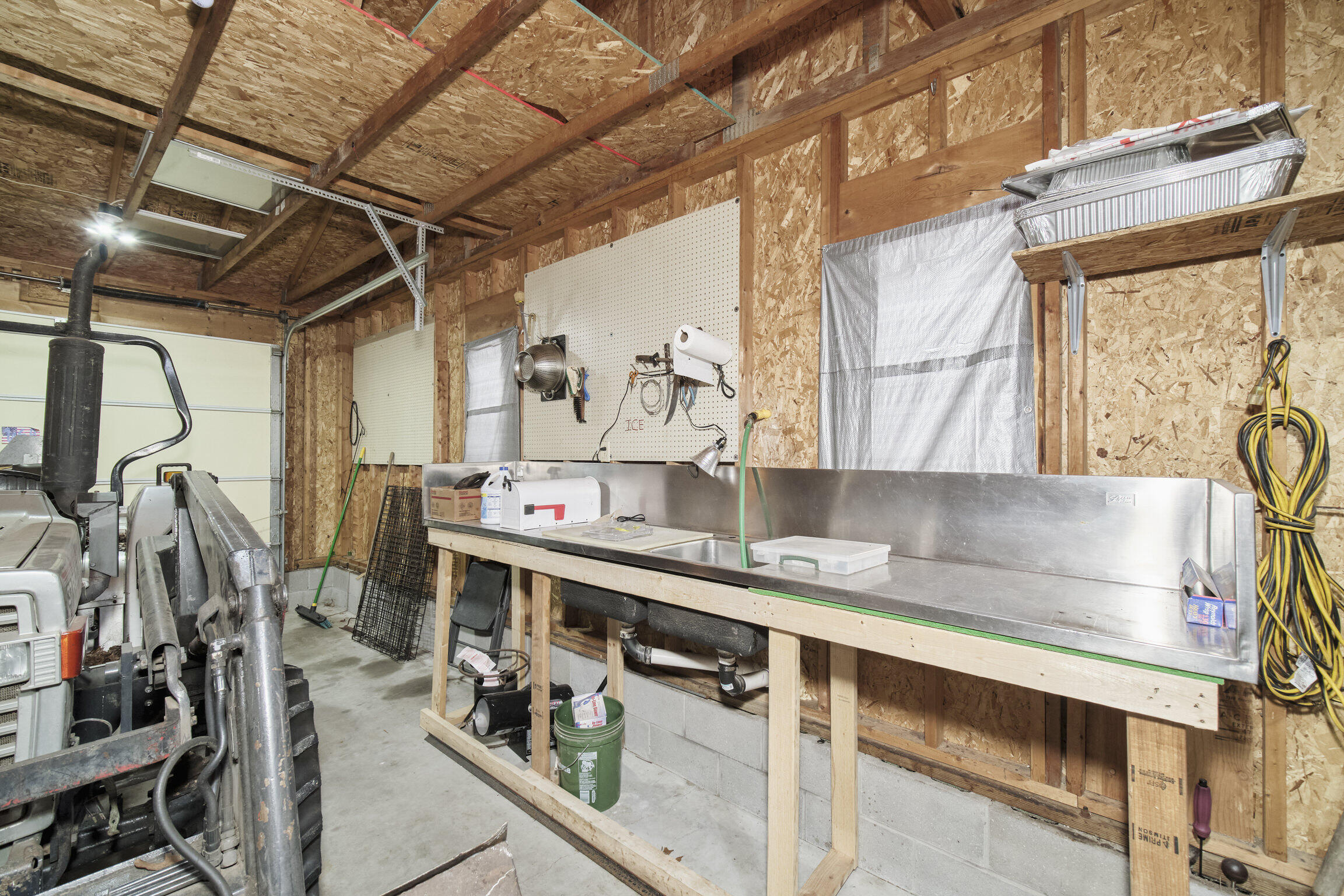 10775 Pine Creek Road Manistee, MI 49660 - Photo 53 of 74 fish cleaning area