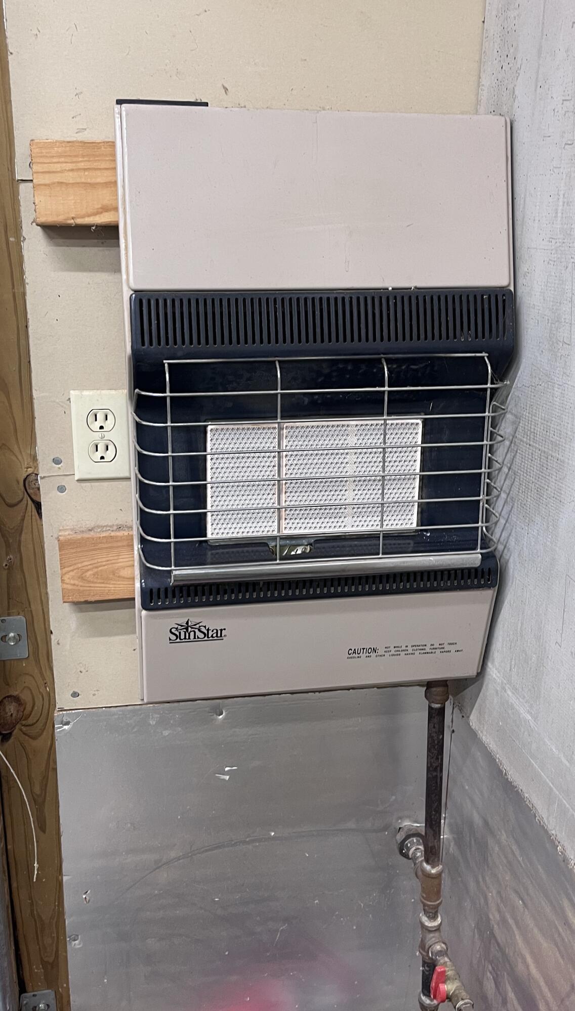 10775 Pine Creek Road Manistee, MI 49660 - Photo 61 of 74 Heater in work rm