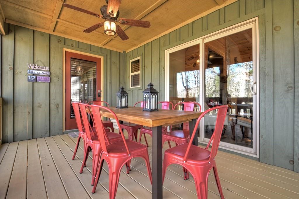 33 Carley Drive Morganton, GA 30560 - Photo 28 of 54 a view of a dining room with furniture window and wooden floor