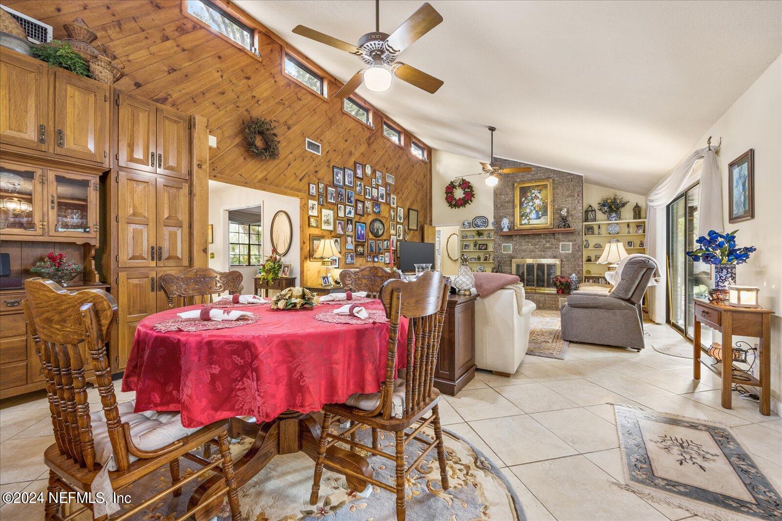 195 Horseman Club Road Palatka, FL 32177 - Photo 19 of 58 a view of a dining room with furniture