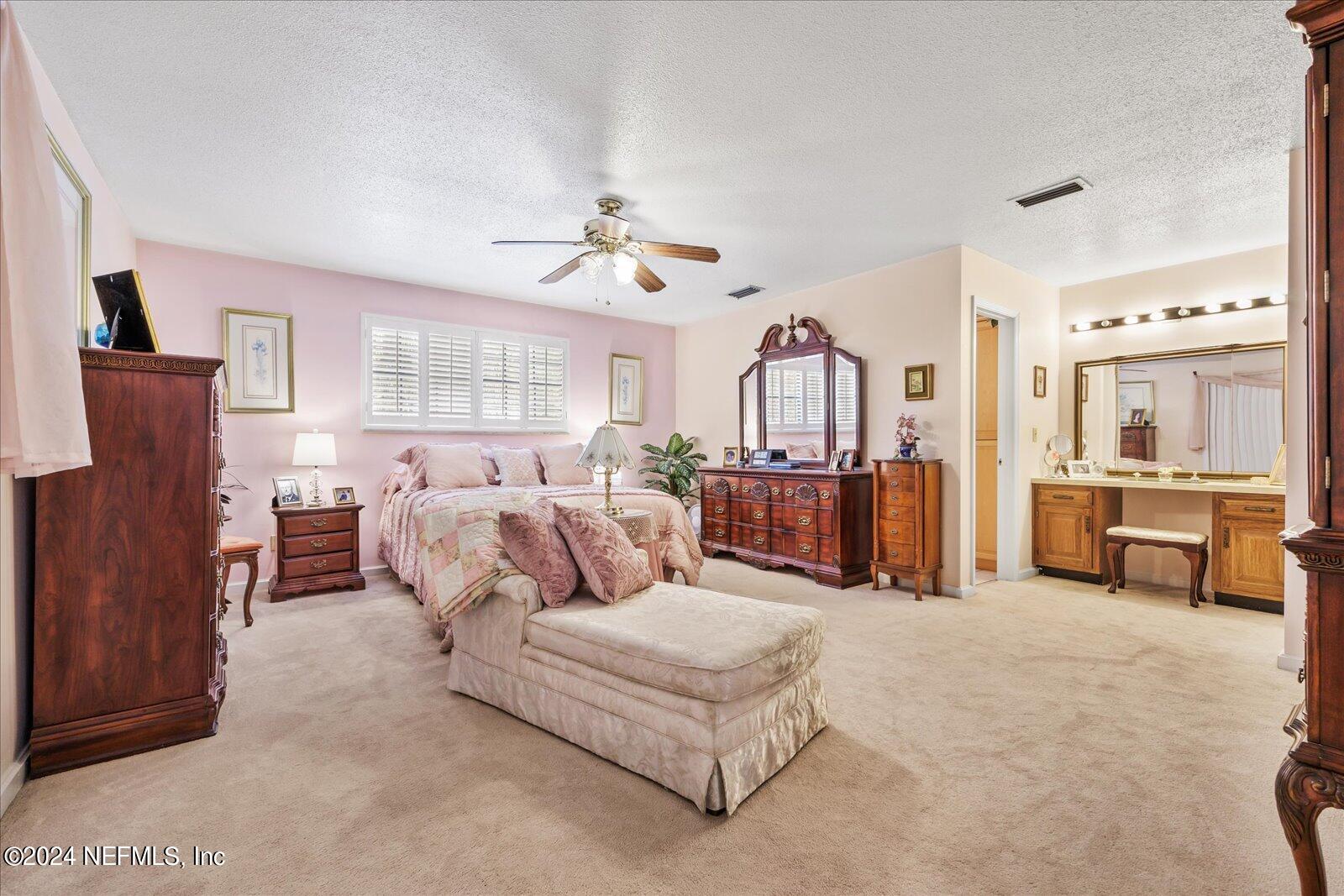195 Horseman Club Road Palatka, FL 32177 - Photo 27 of 58 a living room with furniture and a large window