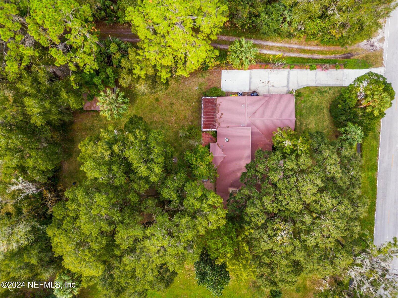 195 Horseman Club Road Palatka, FL 32177 - Photo 52 of 58 an aerial view of a house with a yard