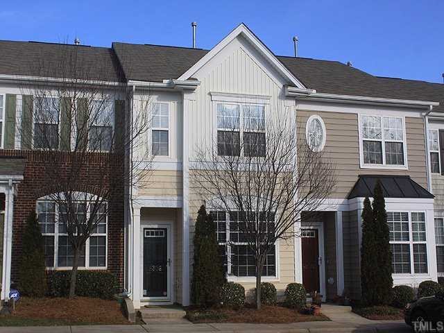 8302 City Loft Court Raleigh, NC 27613 - Photo 1 of 10 a front view of a house with a garden