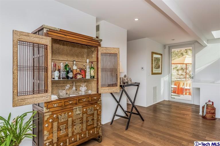 333 Manford Way Pasadena, CA 91105 - Photo 12 of 60 a kitchen with stainless steel appliances granite countertop a stove and a wooden floors