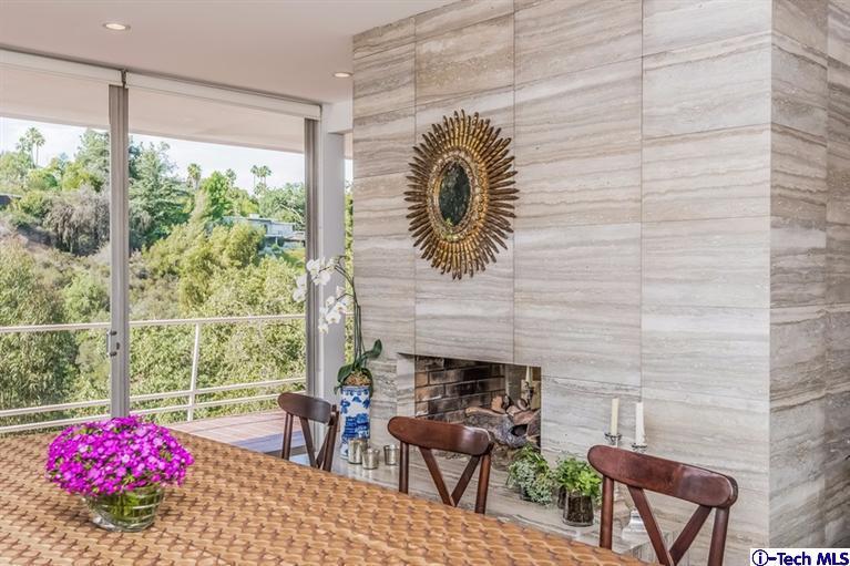 333 Manford Way Pasadena, CA 91105 - Photo 21 of 60 a front view of a house with outdoor seating