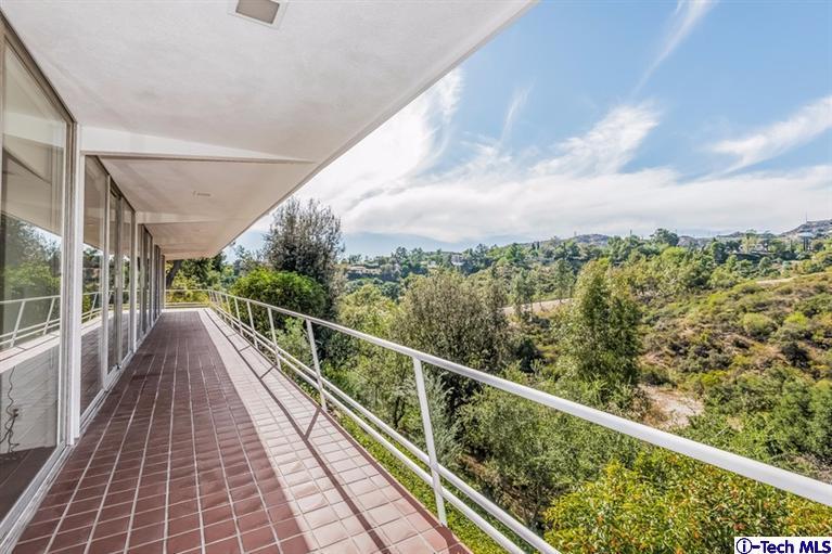 333 Manford Way Pasadena, CA 91105 - Photo 24 of 60 a view of balcony with wooden floor