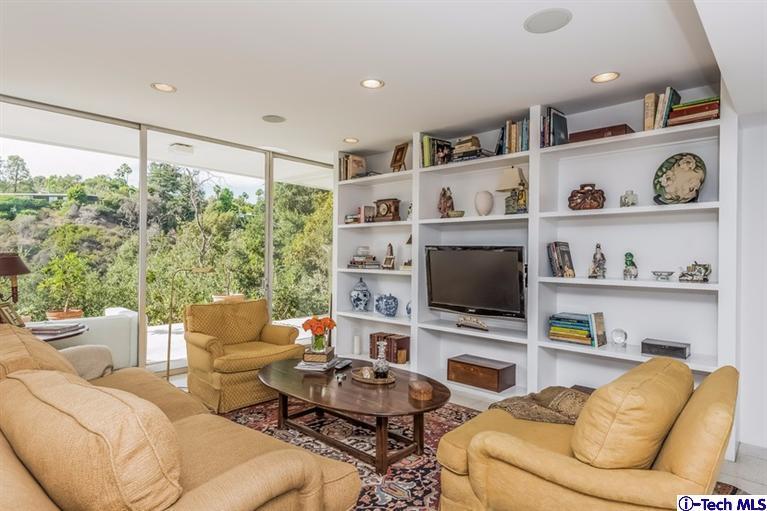 333 Manford Way Pasadena, CA 91105 - Photo 40 of 60 a living room with furniture and a flat screen tv