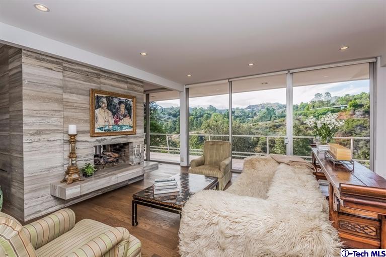 333 Manford Way Pasadena, CA 91105 - Photo 9 of 60 a bedroom with furniture and a large window