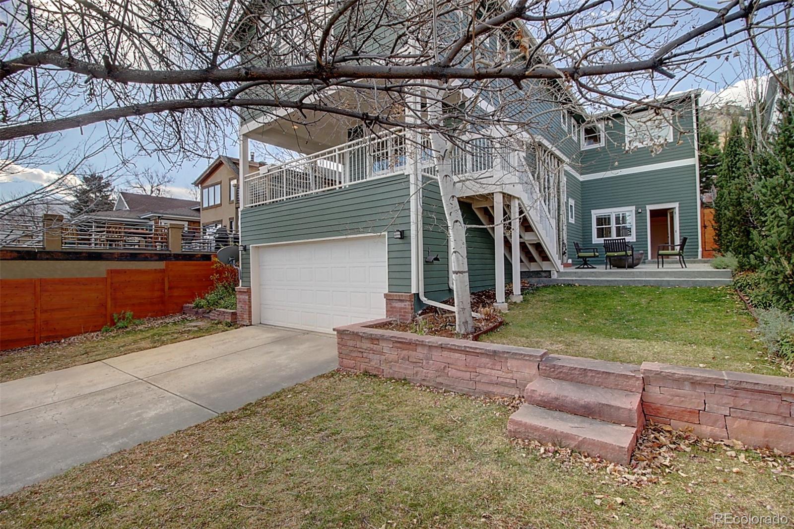2942 4th Street Boulder, CO 80304 - Photo 2 of 22 a view of a house with a patio