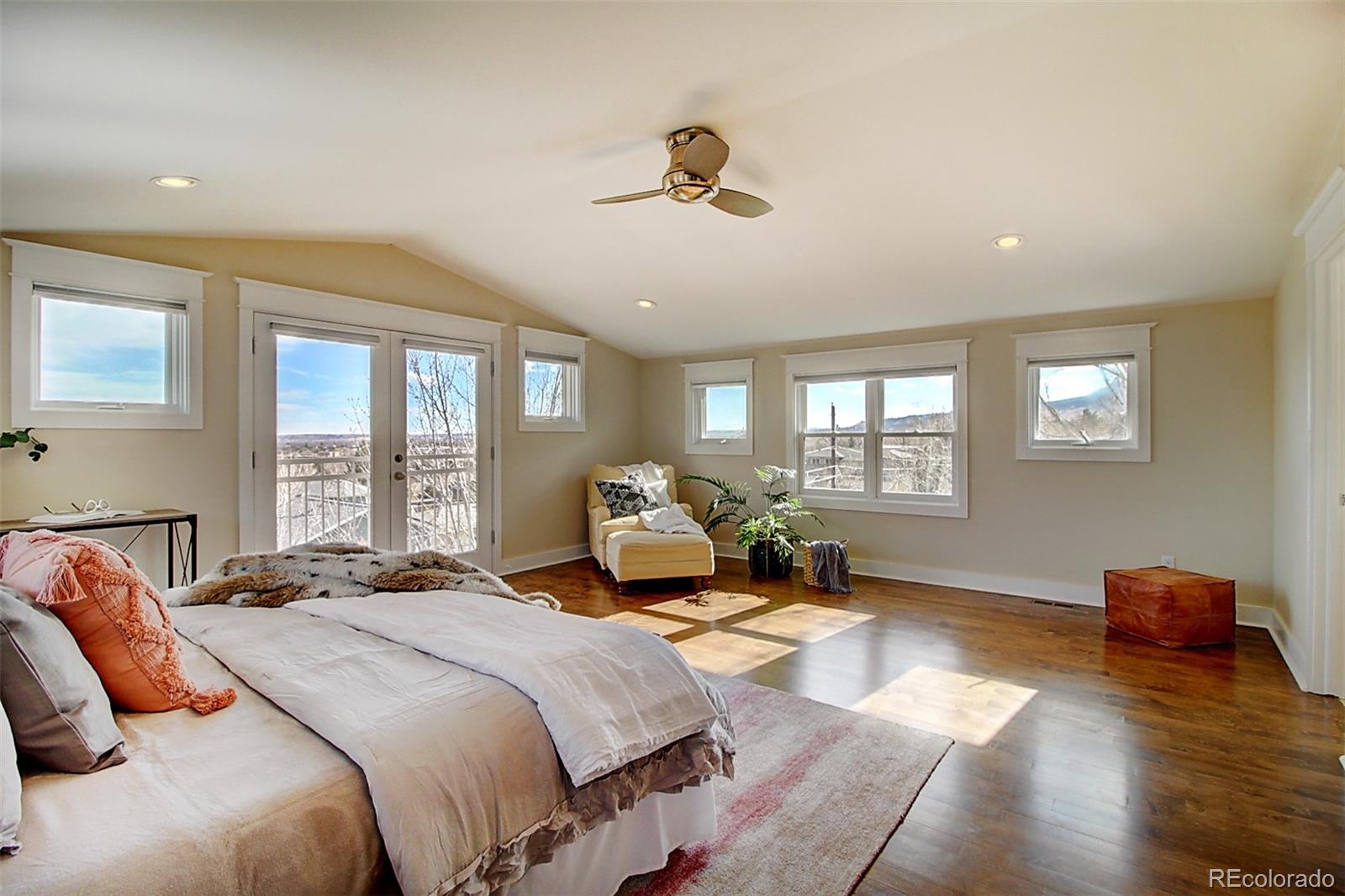 2942 4th Street Boulder, CO 80304 - Photo 5 of 22 a spacious bedroom with a bed and wooden floor