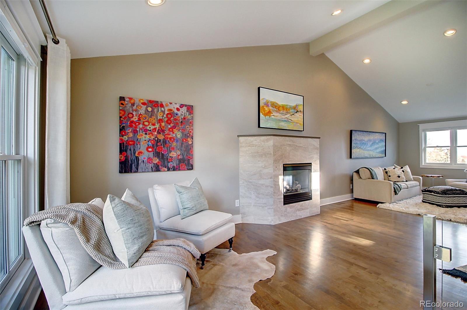 2942 4th Street Boulder, CO 80304 - Photo 6 of 22 a living room with furniture window and a fireplace