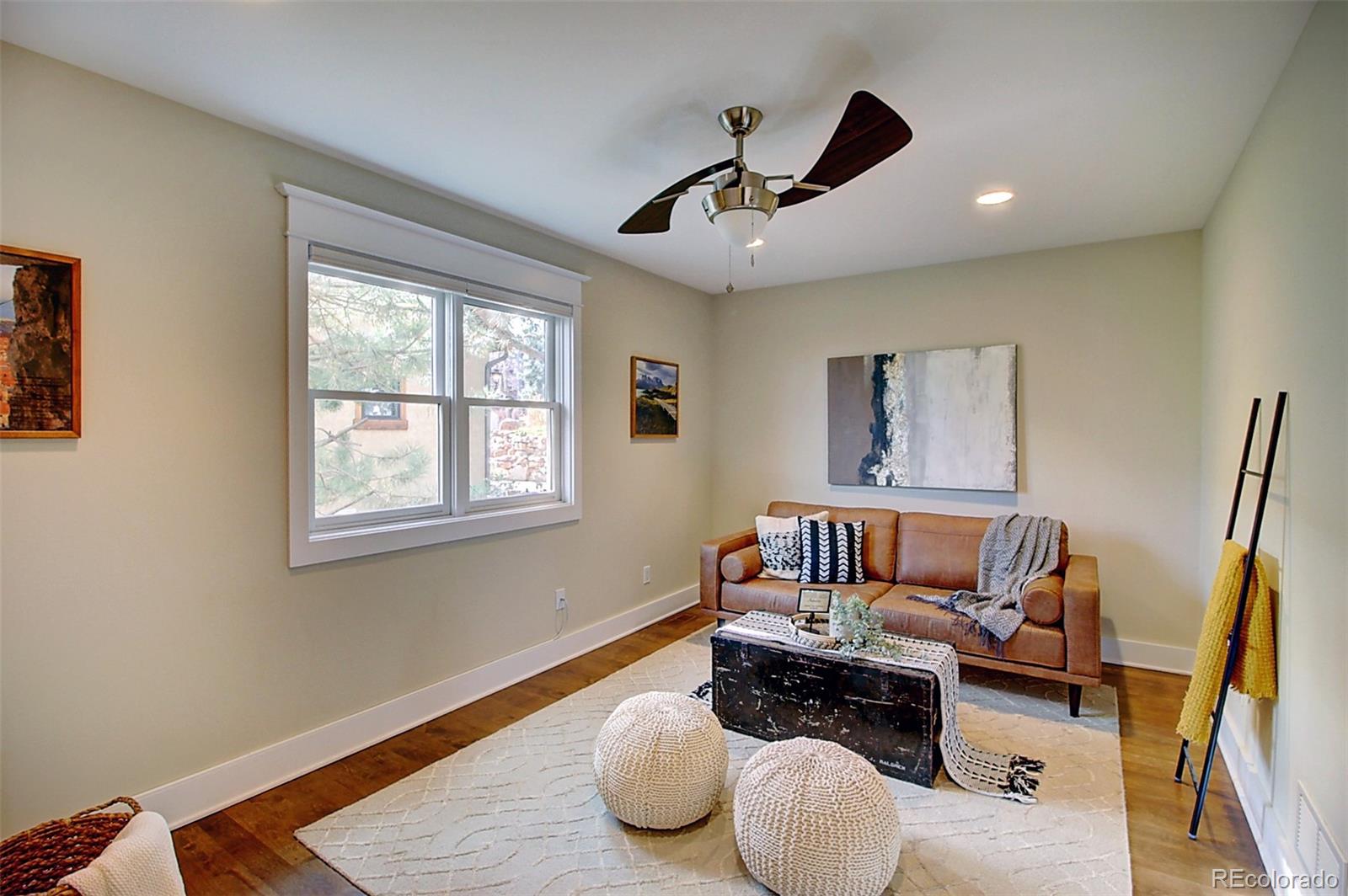 2942 4th Street Boulder, CO 80304 - Photo 8 of 22 a living room with furniture and a wooden floor