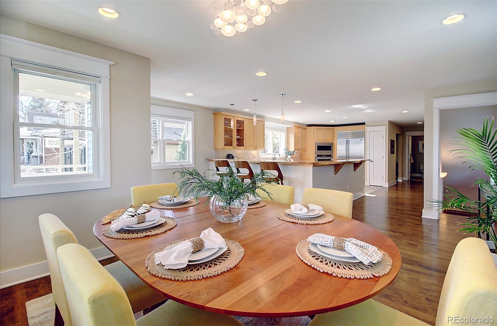 2942 4th Street Boulder, CO 80304 - Photo 10 of 22 a dining room with furniture and a wooden floor