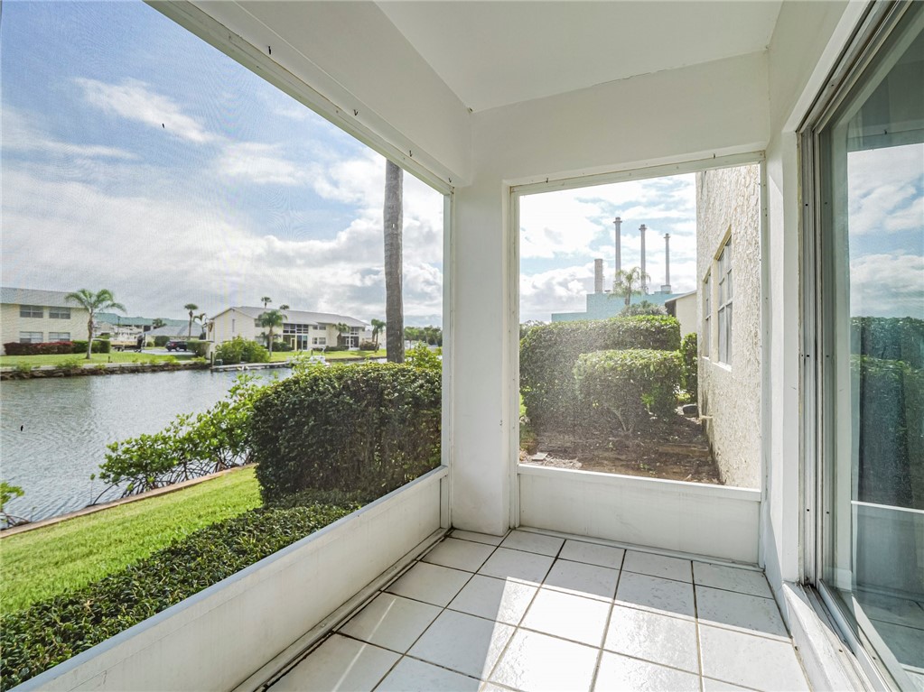 1860 Robalo Drive, Unit 105A Vero Beach, FL 32960 - Photo 22 of 35 a view of a balcony with lake view