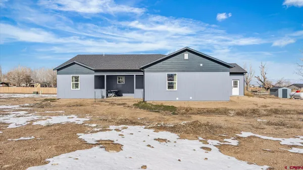 a bedroom with bed and walk in closet
