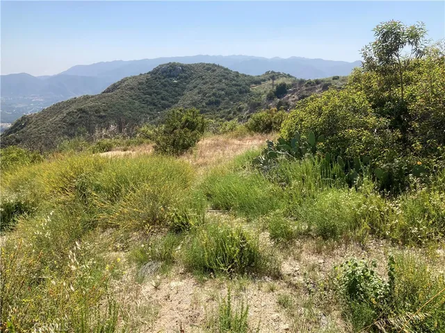 a view of mountain view with mountains in the background