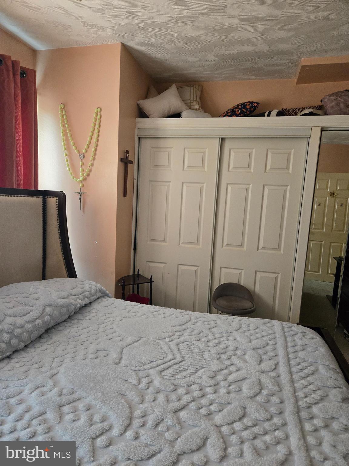 5112 North Fairhill Street Philadelphia, PA 19120 - Photo 15 of 20 a bedroom with a bed and a dresser