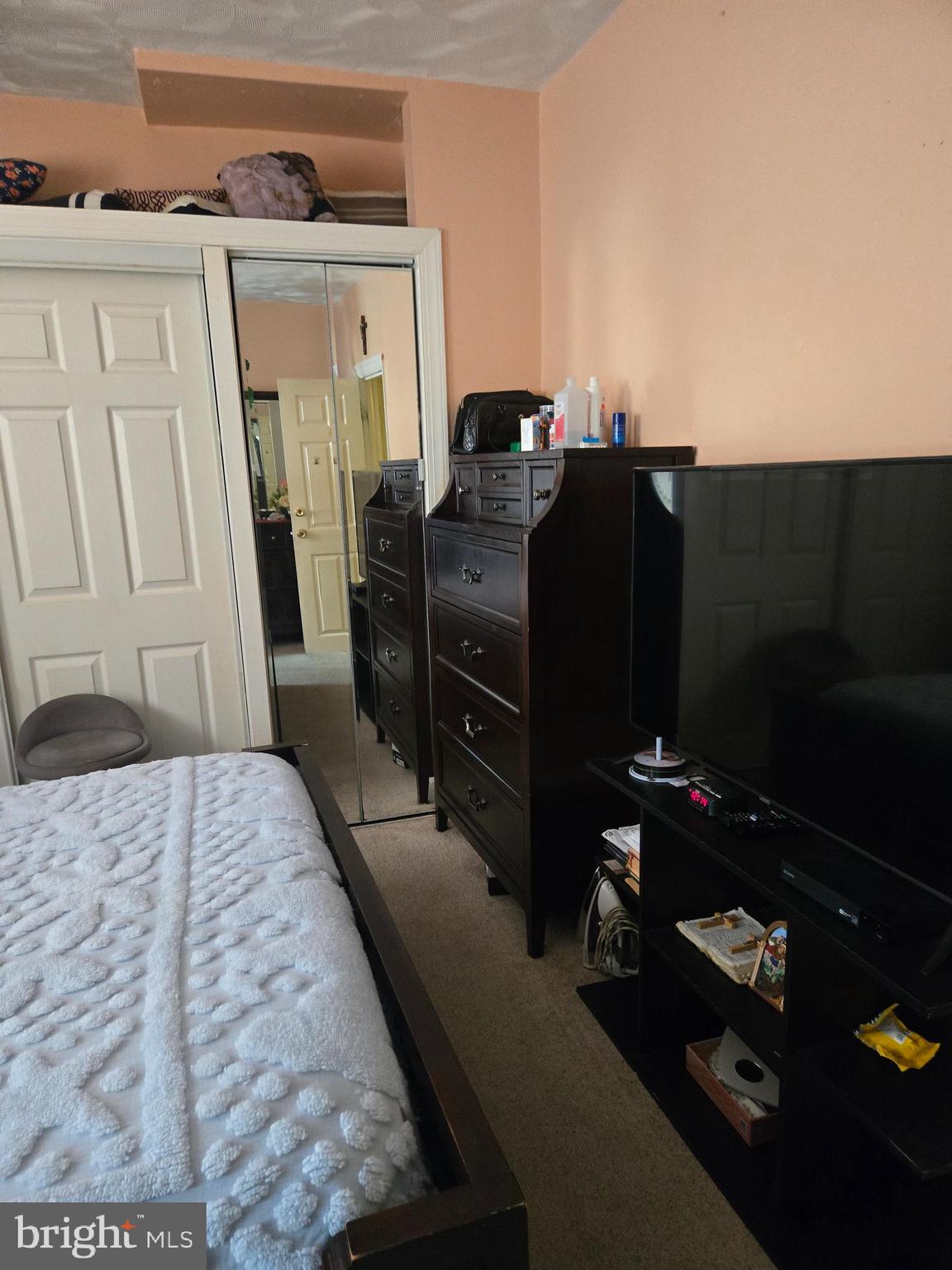 5112 North Fairhill Street Philadelphia, PA 19120 - Photo 16 of 20 a bedroom with a bed and teddy bear on bed