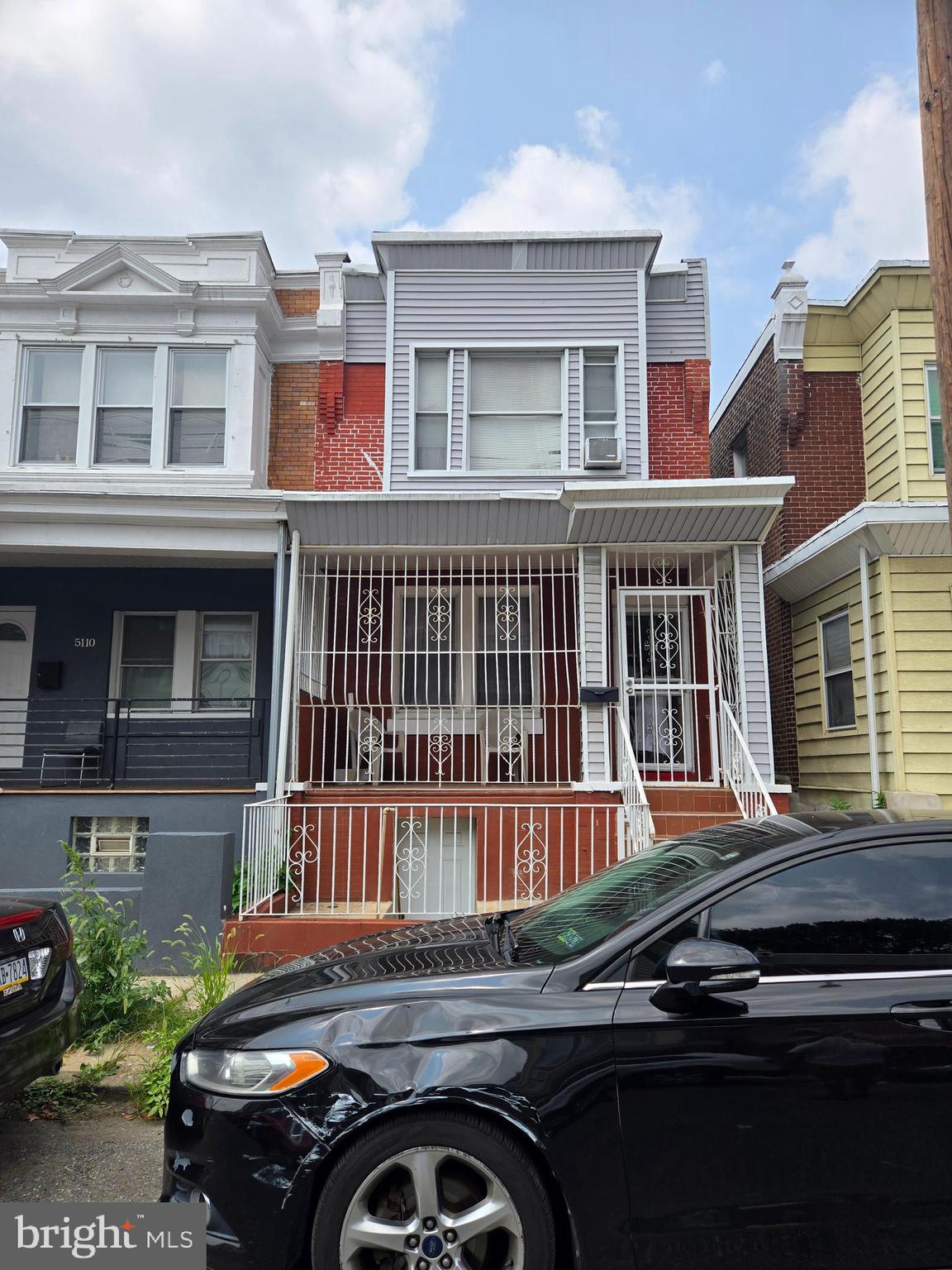 5112 North Fairhill Street Philadelphia, PA 19120 - Photo 2 of 20 a car parked in front of a house