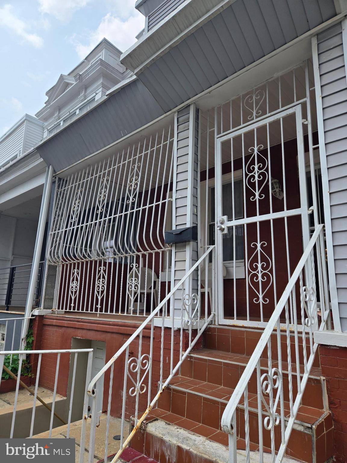 5112 North Fairhill Street Philadelphia, PA 19120 - Photo 3 of 20 a view of balcony with wooden floor and fence