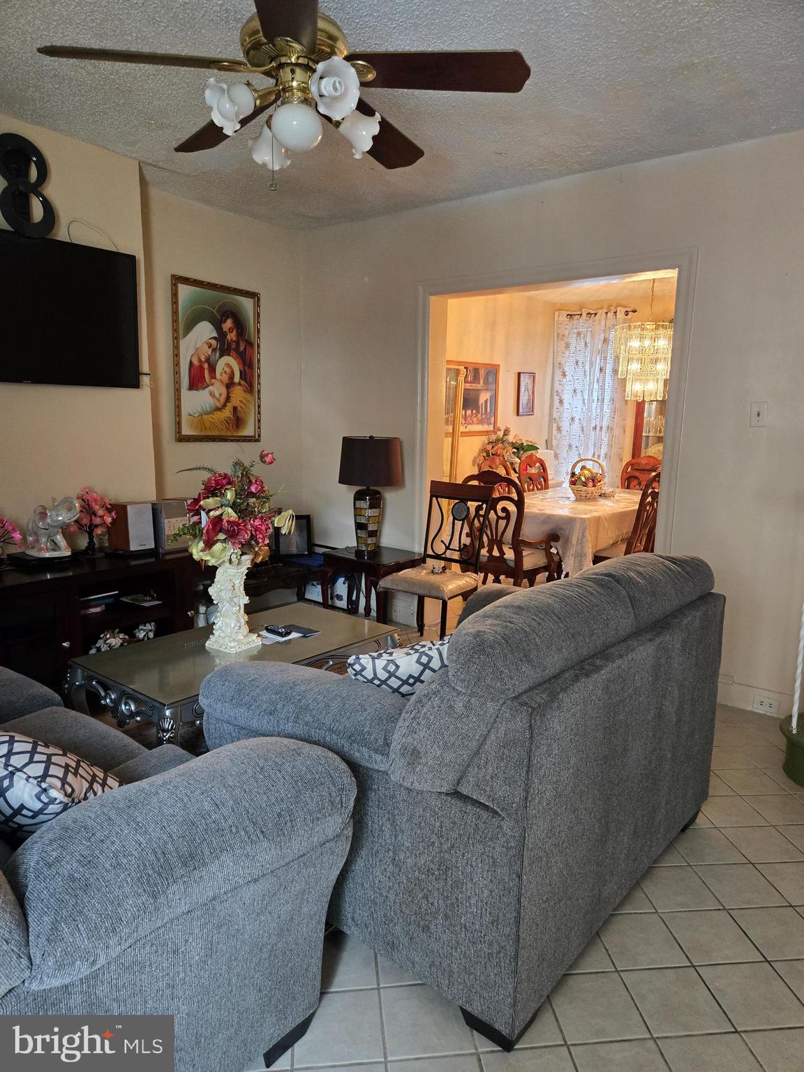 5112 North Fairhill Street Philadelphia, PA 19120 - Photo 6 of 20 a living room with furniture and a large window