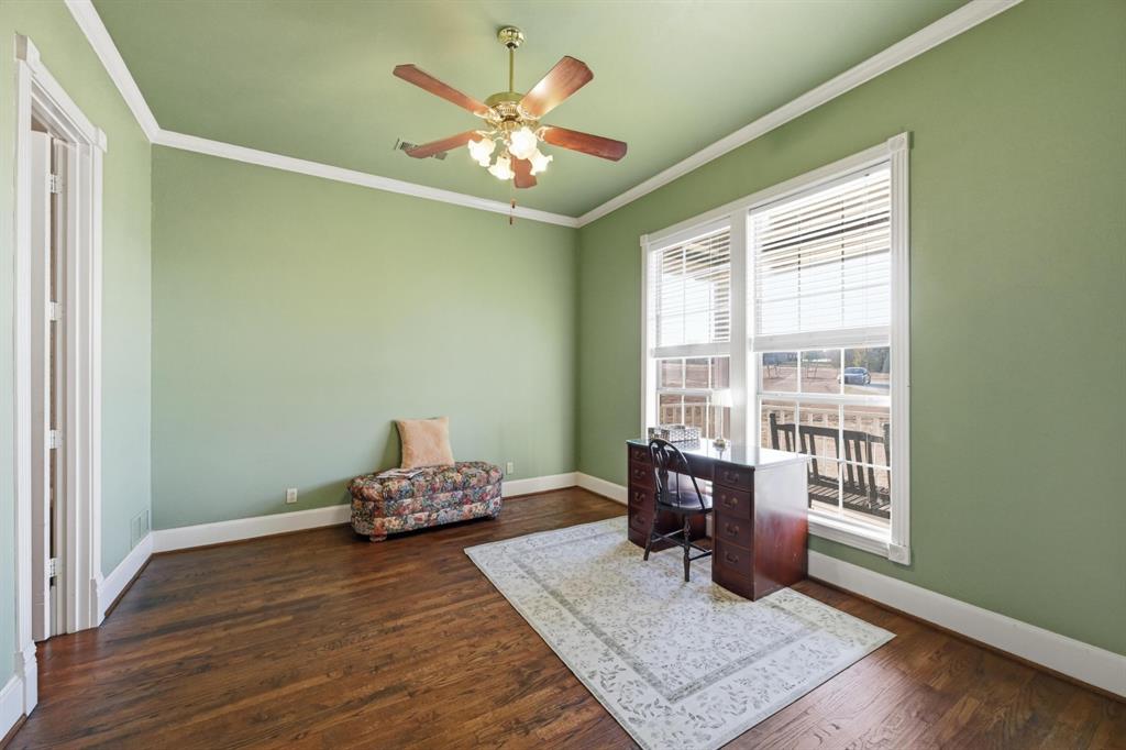 707 Cullins Road Rockwall, TX 75032 - Photo 16 of 40 a living room with furniture and wooden floor