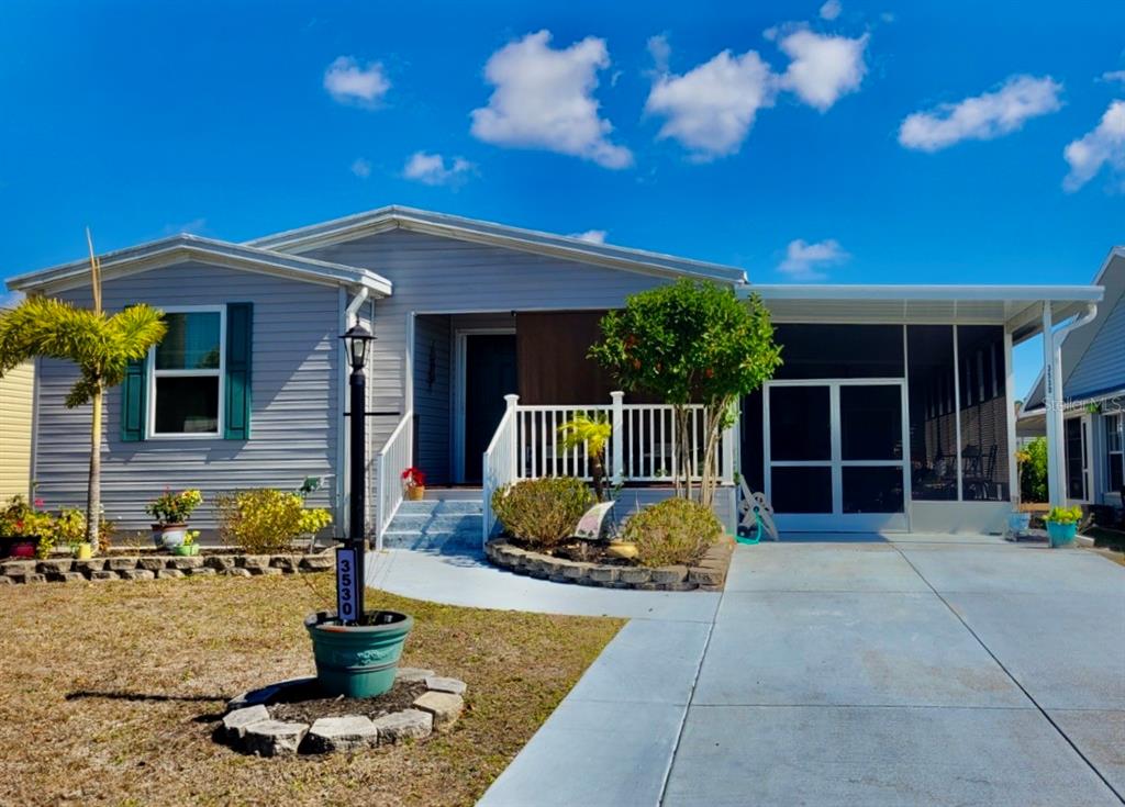 a front view of a house with porch
