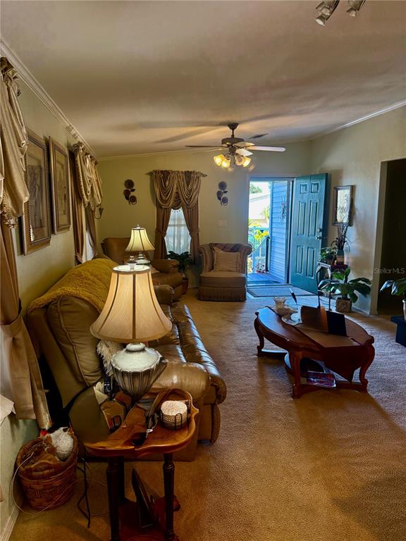 3530 Rossmere Road Port Charlotte, FL 33953 - Photo 24 of 32 a living room with furniture and wooden floor