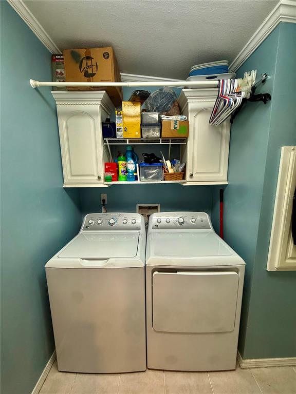3530 Rossmere Road Port Charlotte, FL 33953 - Photo 27 of 32 a utility room with dryer and washer