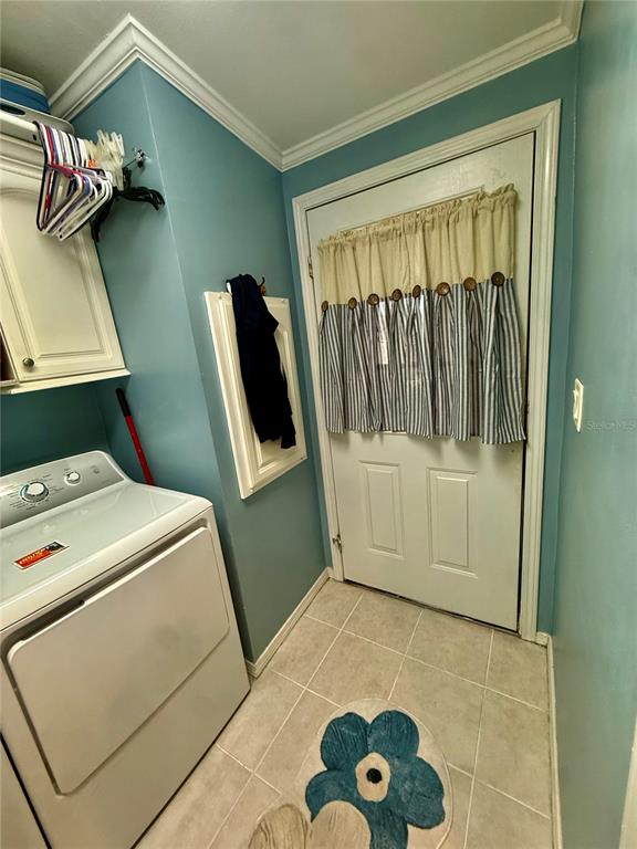 3530 Rossmere Road Port Charlotte, FL 33953 - Photo 28 of 32 a utility room with dryer and washer