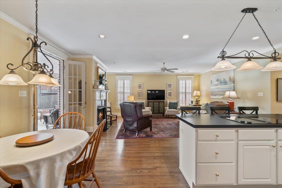 1436 Wolf Park Road Germantown, TN 38138 - Photo 16 of 34 a view of a dining room with furniture and wooden floor