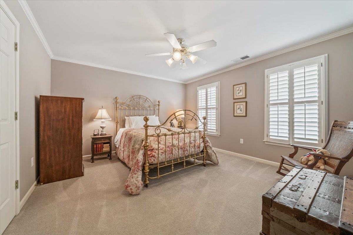 1436 Wolf Park Road Germantown, TN 38138 - Photo 25 of 34 a bedroom with a bed and a window