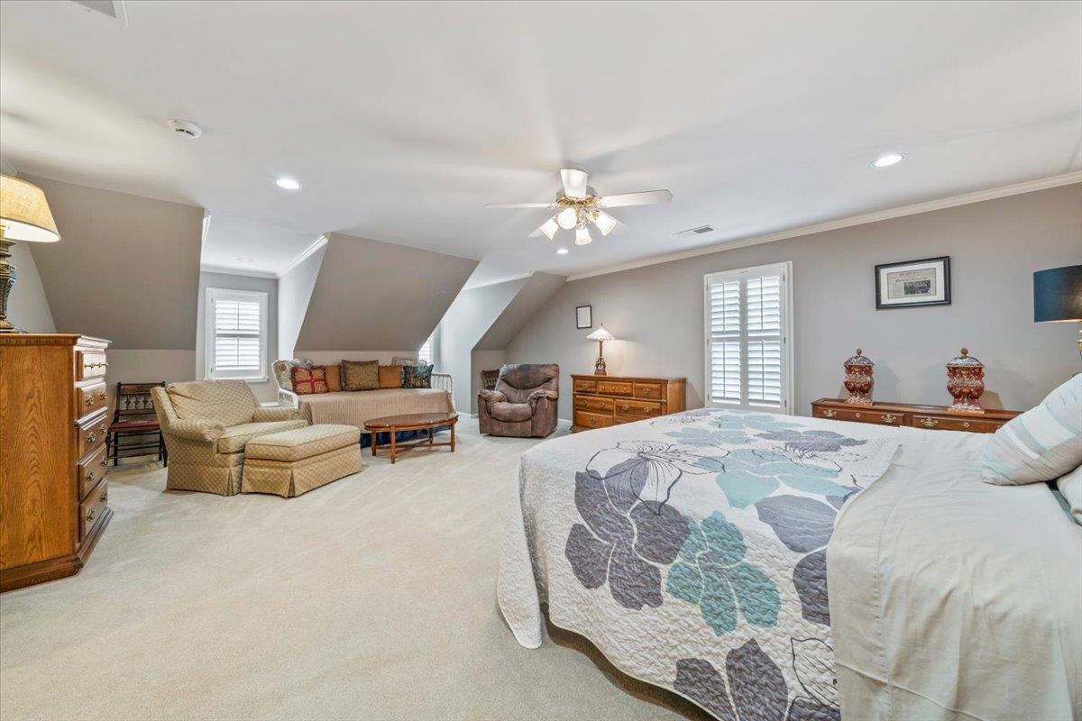 1436 Wolf Park Road Germantown, TN 38138 - Photo 28 of 34 a bed room with furniture and a chandelier