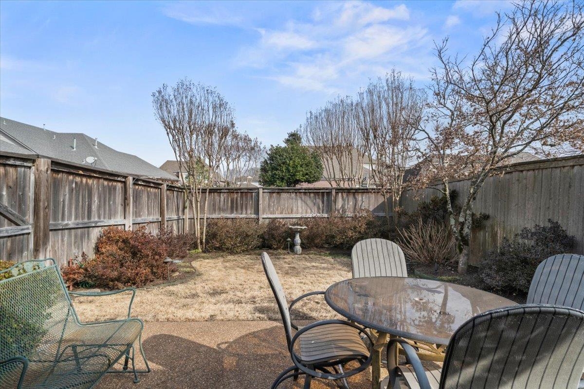 1436 Wolf Park Road Germantown, TN 38138 - Photo 30 of 34 a view of a backyard with furniture