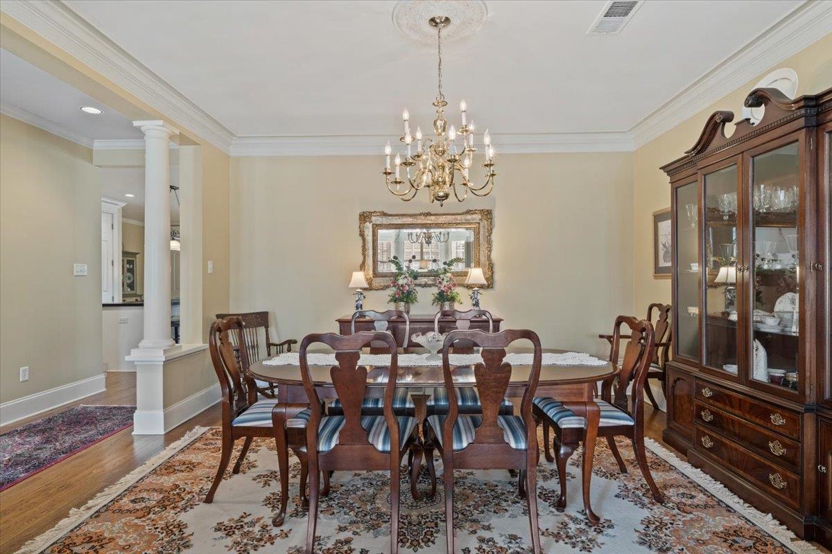 1436 Wolf Park Road Germantown, TN 38138 - Photo 10 of 34 a view of a dining room with furniture window and outside view