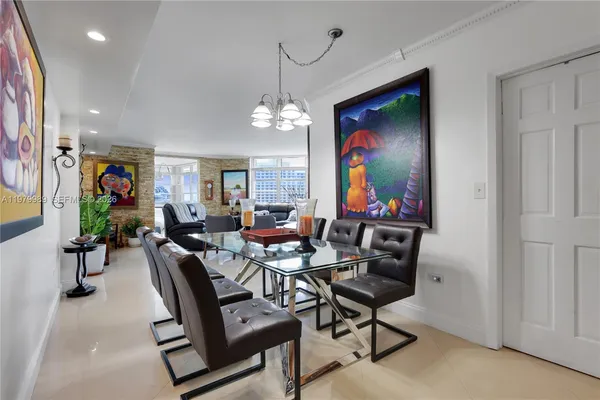 a kitchen with stainless steel appliances granite countertop a stove a sink dishwasher and a microwave oven on granite countertops