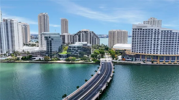 a view of a city with tall buildings