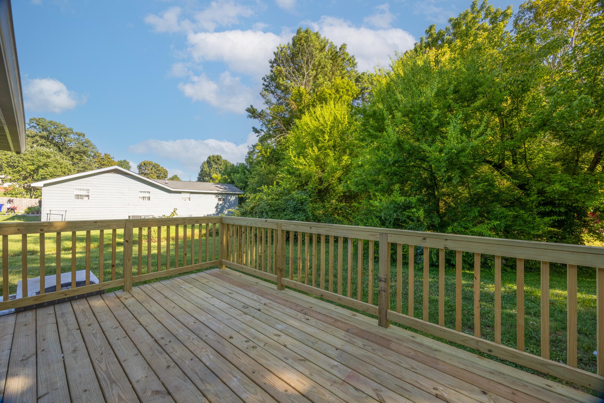 2002 Young Road Southeast Cleveland, TN 37323 - Photo 19 of 21 a view of a wooden deck with a yard