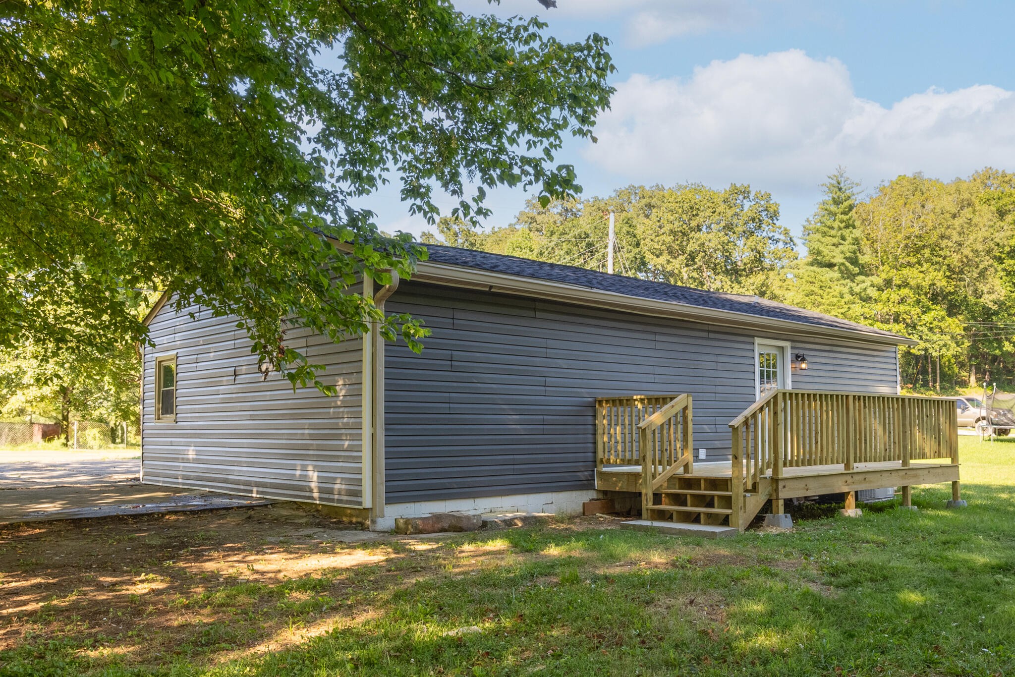 2002 Young Road Southeast Cleveland, TN 37323 - Photo 20 of 21 a view of a house with a backyard