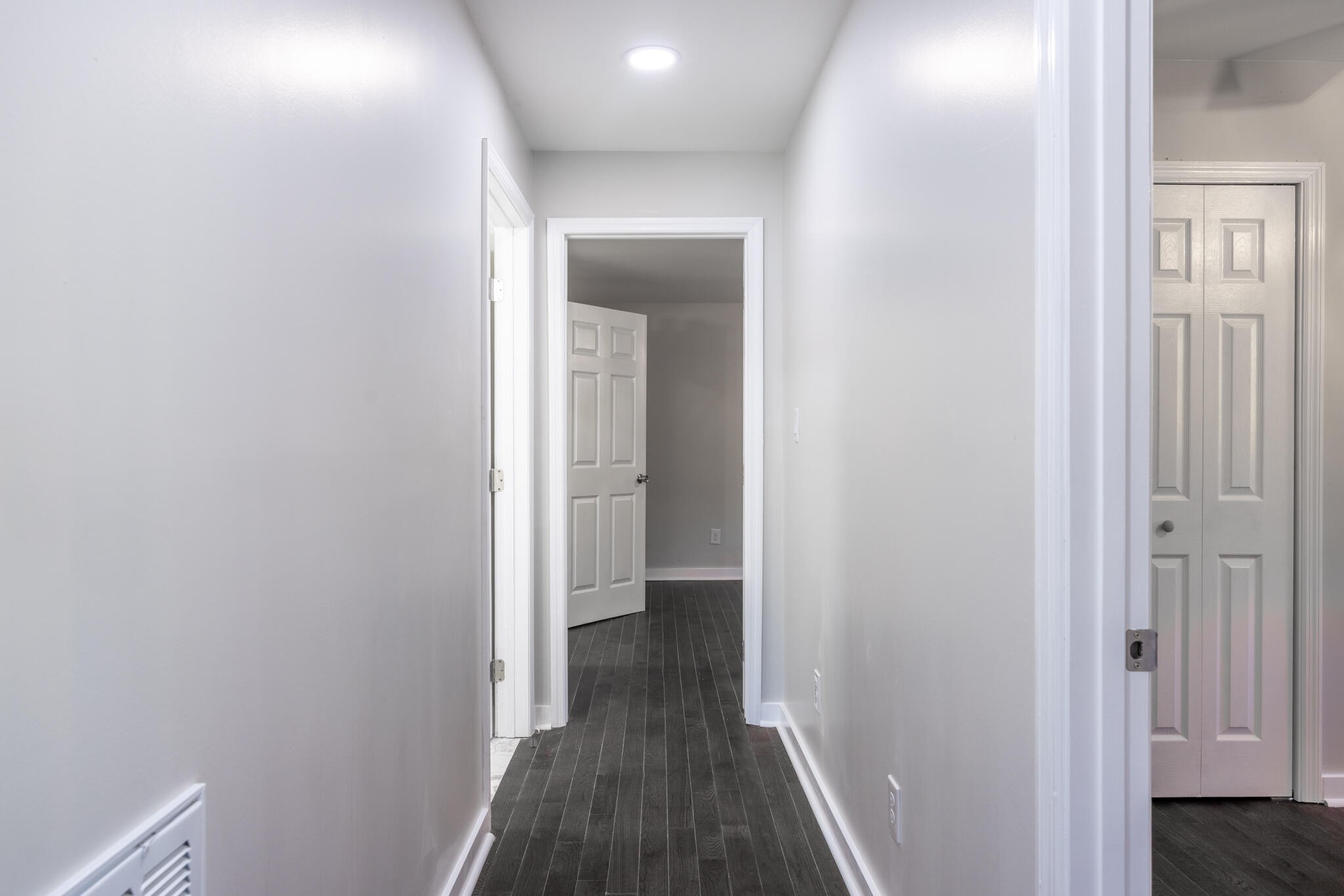 2002 Young Road Southeast Cleveland, TN 37323 - Photo 10 of 21 a view of a hallway with wooden floor