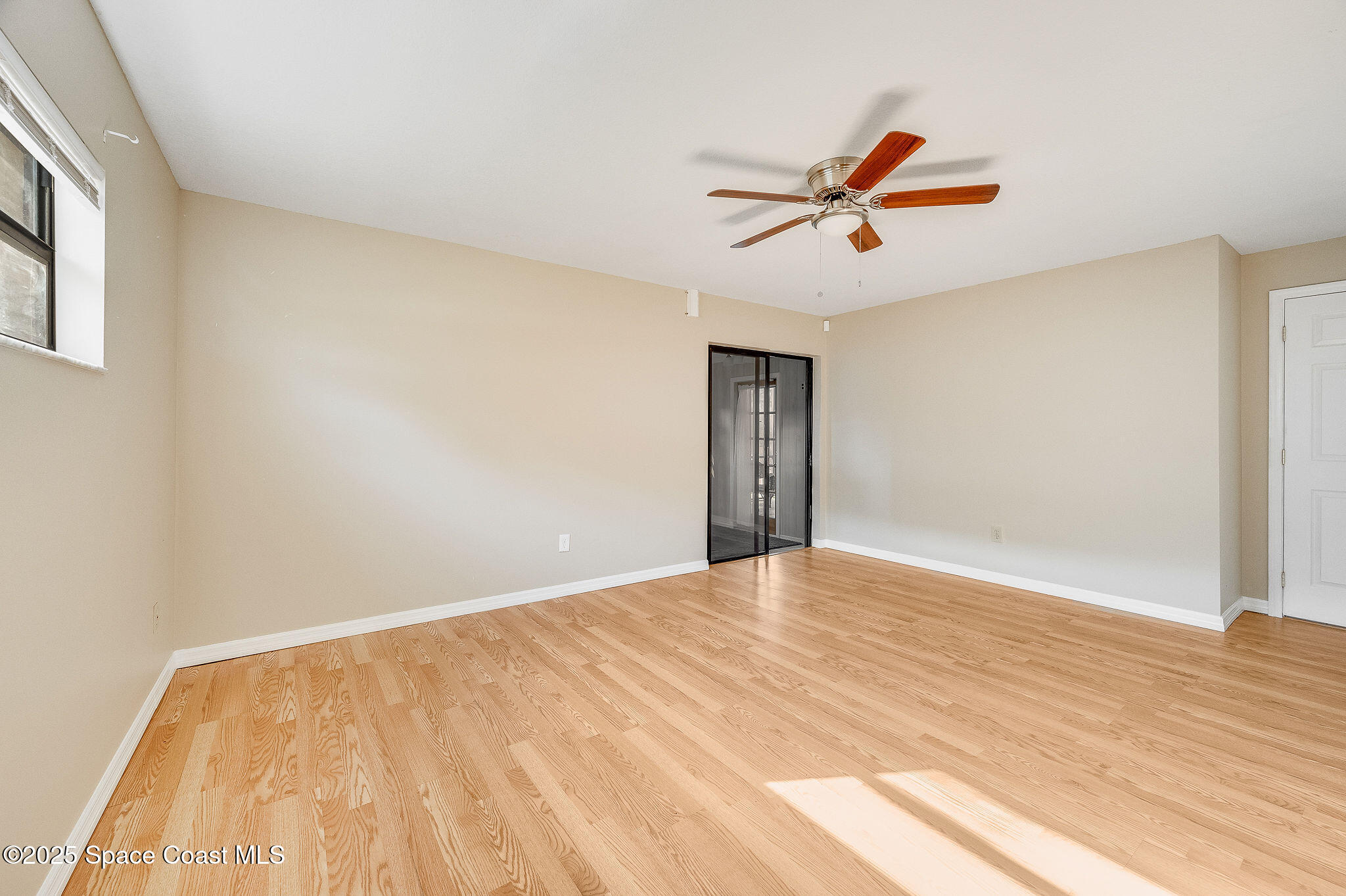 115 Angelo Road Southeast Palm Bay, FL 32909 - Photo 10 of 38 a view of empty room with ceiling fan