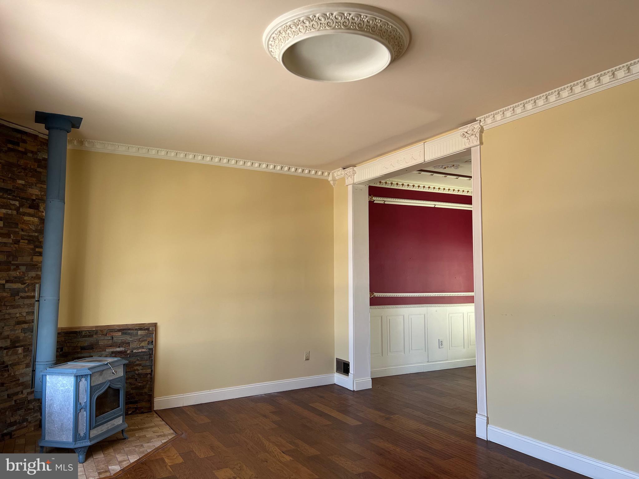 5808 Nystrom Street Hyattsville, MD 20784 - Photo 4 of 38 a view of a room with wooden floor