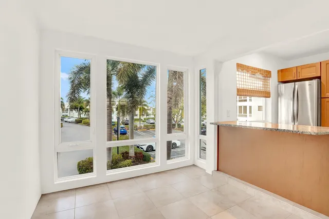 $225,000 | 32 Colonial Club Drive, Unit 203, Boynton Beach, FL 33435