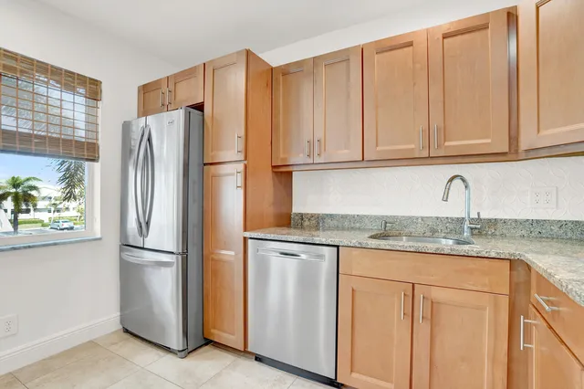 $225,000 | 32 Colonial Club Drive, Unit 203, Boynton Beach, FL 33435