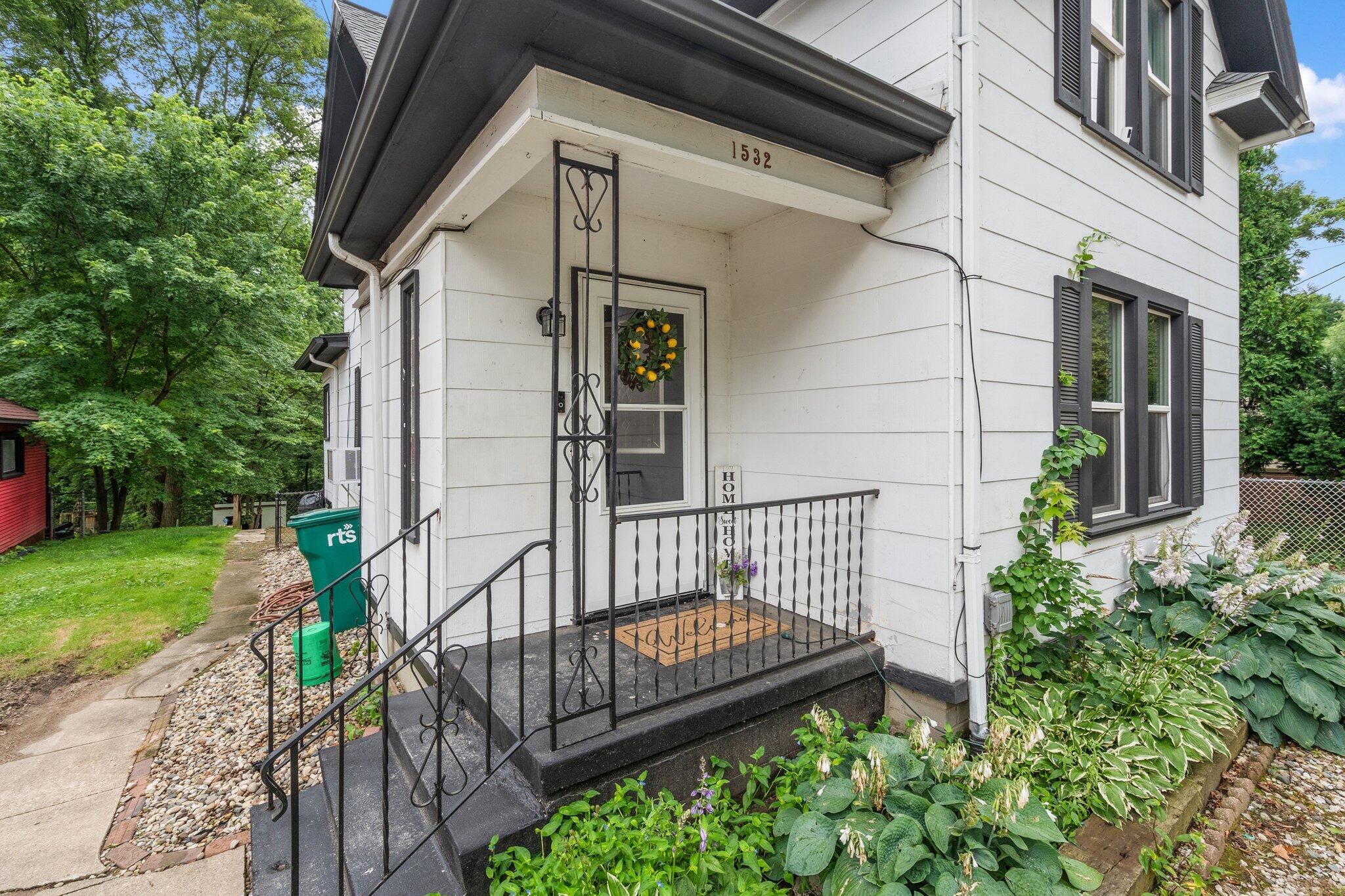 1532 2nd Street La Porte, IN 46350 - Photo 2 of 31 a view of a porch with a bench