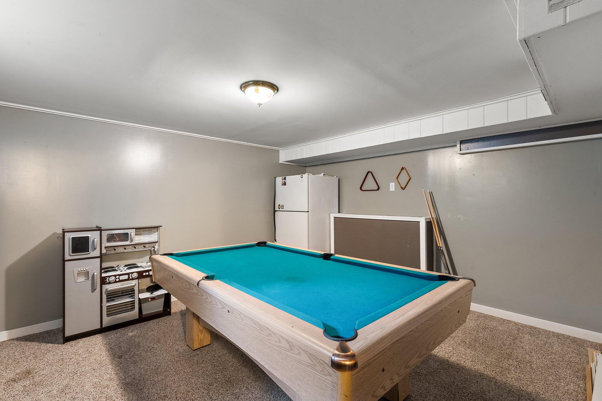 1532 2nd Street La Porte, IN 46350 - Photo 22 of 31 a room with pool table and windows