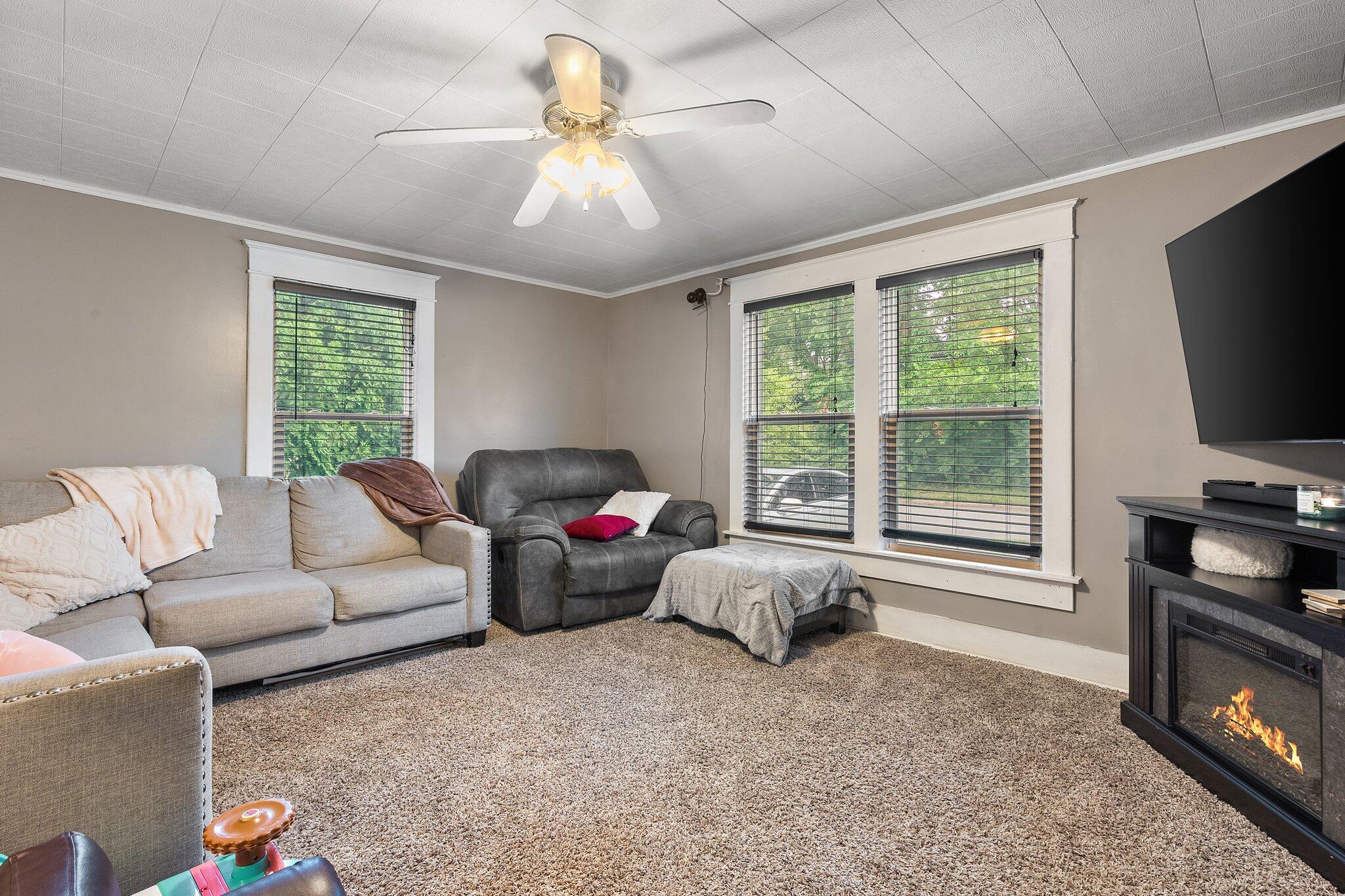 1532 2nd Street La Porte, IN 46350 - Photo 5 of 31 a living room with furniture and a flat screen tv
