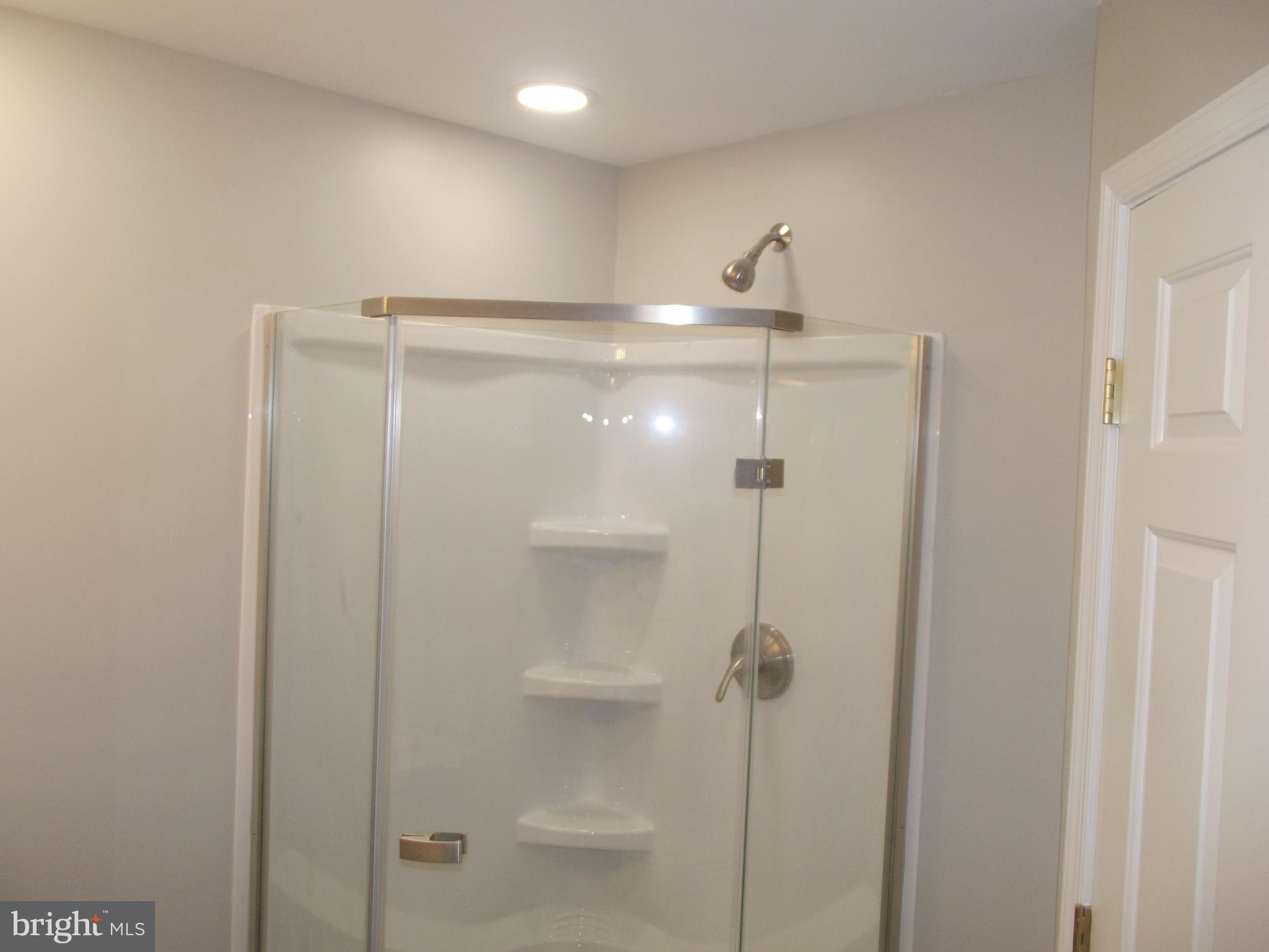 1731 Derrs Square West Frederick, MD 21701 - Photo 14 of 23 a bathroom with a shower