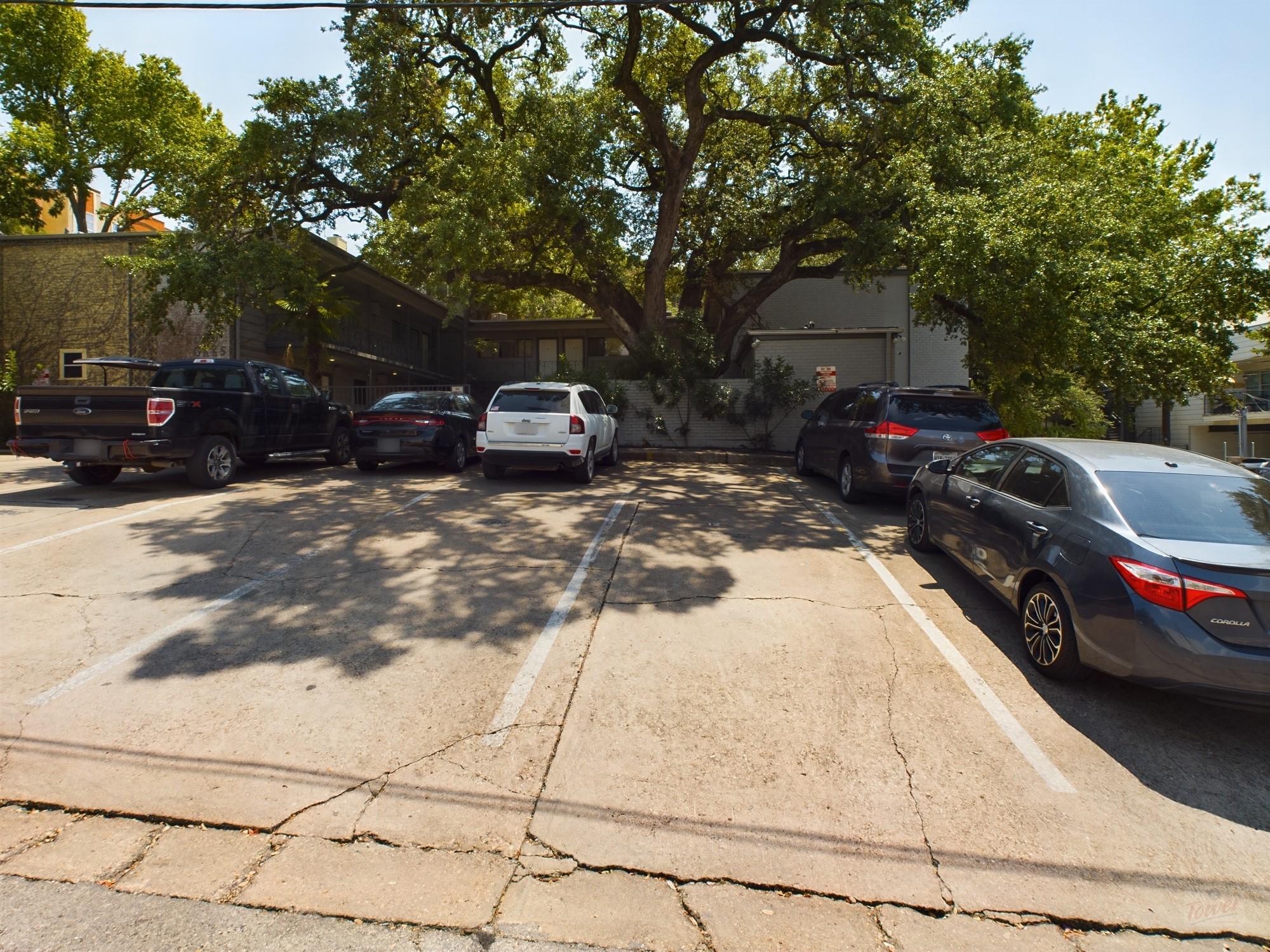803 West 28th Street, Unit 206 Austin, TX 78705 - Photo 24 of 25 a view of a car parked on the side of the road